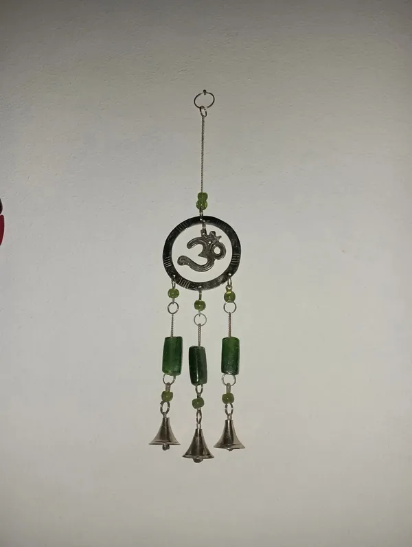 Foto de un comprador: Movil Llamador Colgante Bronce Y Vitro India Buda-om-ganesha Verde Om